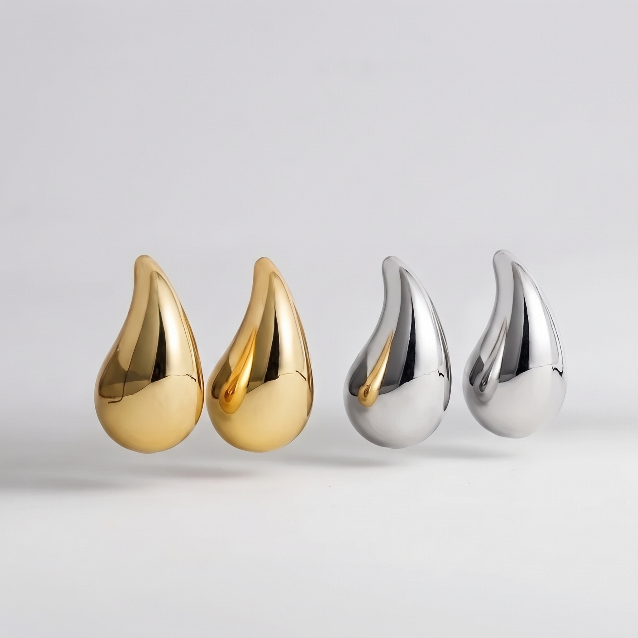 Chunky dome water drop earrings, badge removed