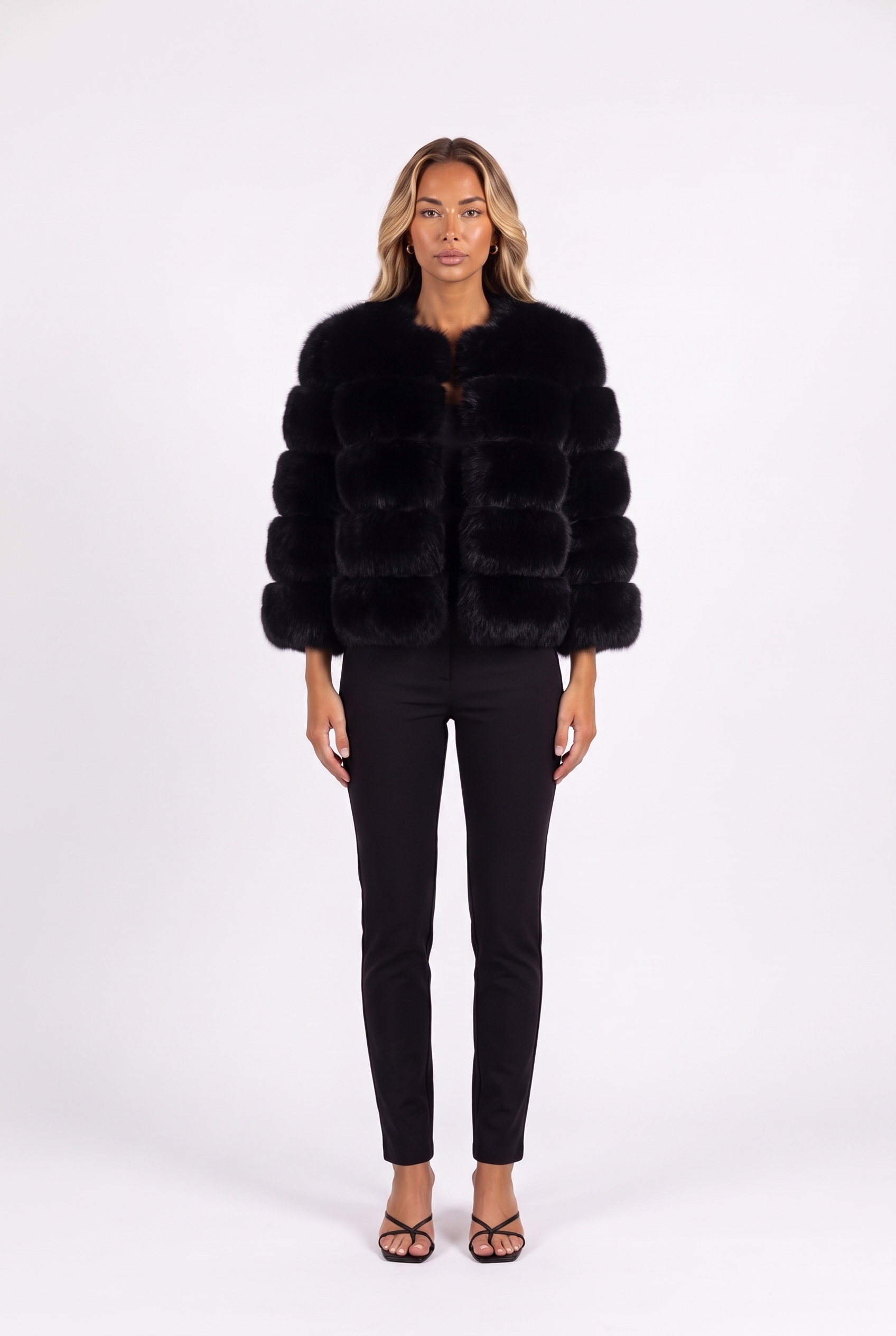 Black cropped faux fur jacket with three-quarter sleeves — front